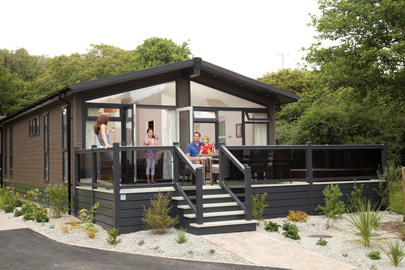 AB Sundecks Picket Glass on raised decking on water over looking the lake